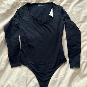 Brand new with tags Abercrombie body suit size medium in black colour